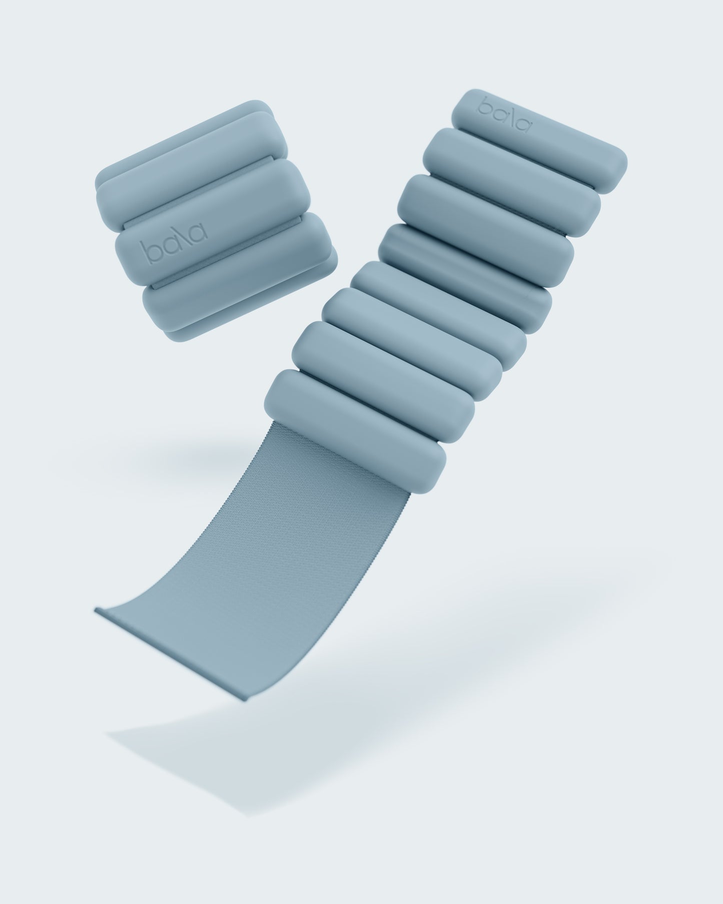 BALA Bangles in Hellblau – flexible Gewichtsmanschetten mit verstellbarem Klettverschluss, ideal für Hand- und Fußgelenke bei Workout und Alltag.