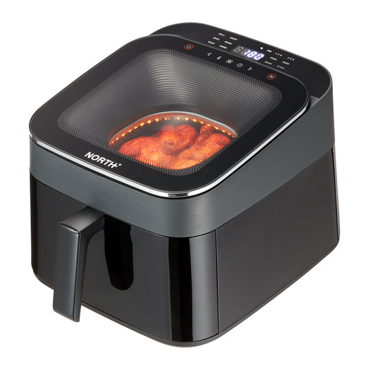 NORTH Air Fryer mit Sichtfenster und digitalem Touchdisplay beim Zubereiten von knusprigen Hähnchenschenkeln
